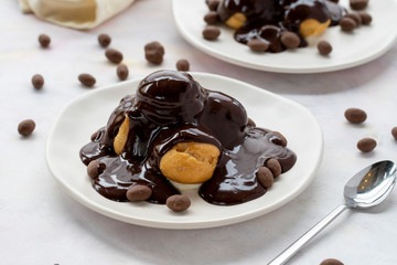 profiterole cake on a white background