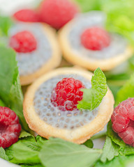 light summer dietary dessert (proper nutrition) is a tart with chia seeds, raspberries and mint. Healthy food for those who look after their figure