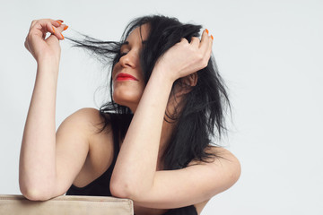 Photo session in the studio. White woman as a model. Portraits