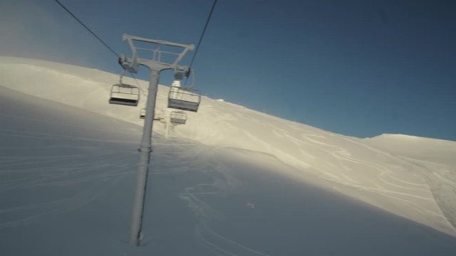The peak of the mountain, sunny day, ski elevator