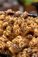 fig dessert with walnuts ready for sale on the counter