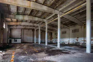 Acrylic prints Old left buildings Old broken empty abandoned industrial building interior