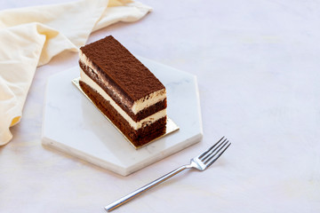 tiramisu cake on white wood
