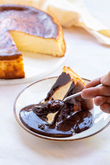 San Sebastian Cheesecake on White Wood