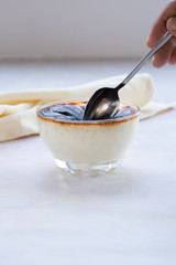 baked rice pudding on white wood - sutlac