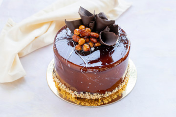 croquant chocolate cake on white wood