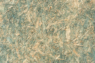 Plakat background of compressed wood chippings used as a building material panel