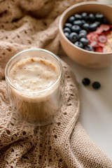 Breakfast with granola, coffee and cakes
