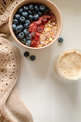 Breakfast with granola, coffee and cakes