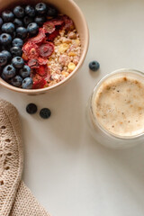 Breakfast with granola, coffee and cakes