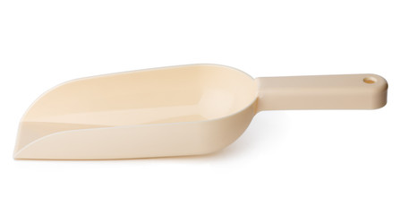 New plastic household scoop isolated on white