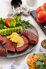 sausage - baked sausage on a white background