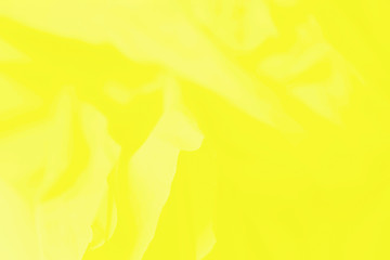 Yellow fabric background, yellow abstract blurred background