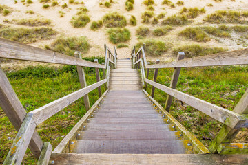 wooden steps heading down over the beach and sand dunes at Lowestoft Suffolk