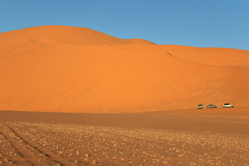 SAFARI ACROSS DESERT DUNES IN TADRART NATIONAL PARK IN ALGERIA. TIN MERZOUGA SAND DUNES. 