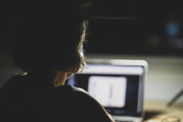 a woman working from the computer