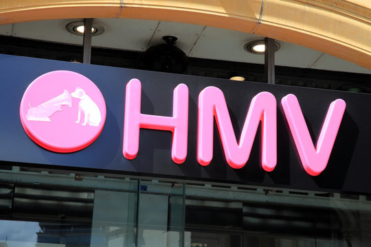 London, United Kingdom, May 8, 2011 : HMV Nipper logo advertising sign outside its retail  business store in Leicester Square stock photo