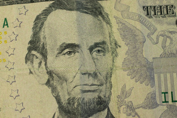 President Lincoln macro photo on 5 dollar banknote