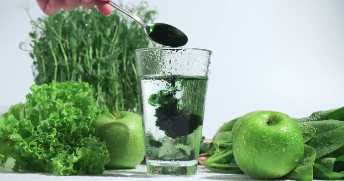 liquid chlorophyll in a glass of water