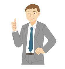 サムズアップのポーズをするスーツの男性