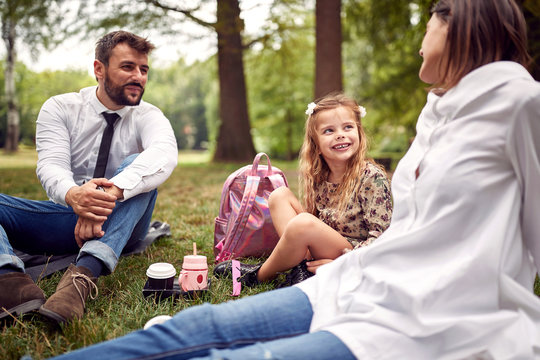 Family having a picnic after school