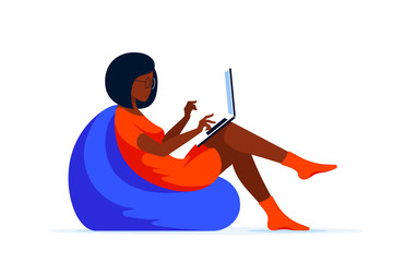 Young woman with laptop sitting in chair bag