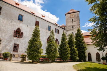 Fototapeta na wymiar Сourtyard with clock tower, Castle Bitov, South Moravia Region, Czech Republic