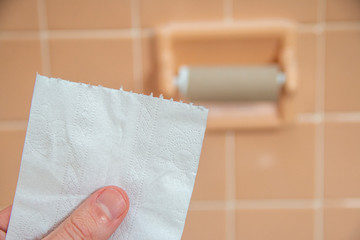Last sheet of toilet paper in the bathroom