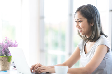 Remote work during epidemic. Woman working from home with the concept of new normal lifestyle