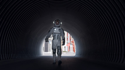 Low Angle Shot of a Confident Handsome Astronaut Walking Towards the Camera in a Metal Tube Tunnel....