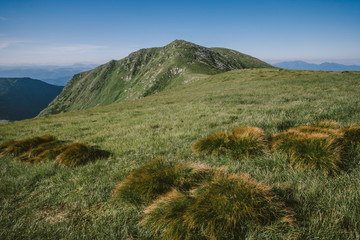 A sign on the side of a mountain