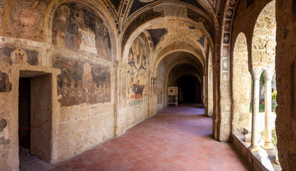 Fototapeta na wymiar cloister of san francesco in Aversa with frescoes