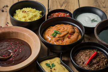 Assorted different types of sauces for dishes.