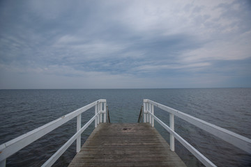 Naklejka premium wooden pier on the sea
