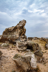 rocky steppe landscape on the background of a cloudy sky with clouds