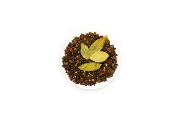 peppers different kind on a plate top view isolated