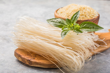 traditional vietnamese pho noodles. ingredient for asian pho bo soup on grey background.