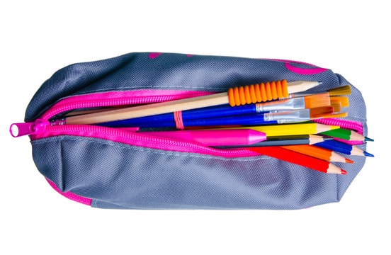 Pencil case with school supplies on white background isolation, top view