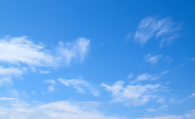White clouds and blue sky. Blurred clouds background.
