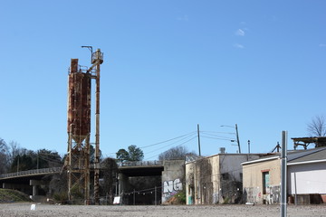 Countryside old farm buildings and an old rustic silo