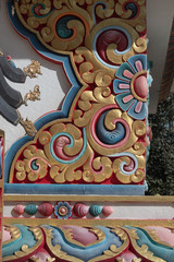 Detail of ornamented corner of a tibetan buddhist stupa.