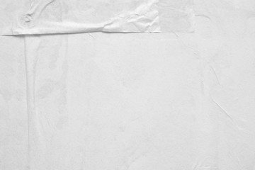 Blank white crumpled and creased paper poster texture background