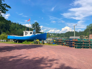 Blue fishing boat Lobster traps in New Brunswick Canada