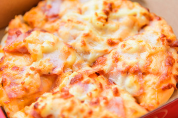pizza Hawaiian Home made on wood plate