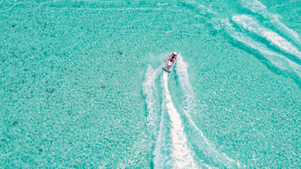 Maldives atoll island Aerial view. Jet Ski, Tropical Ocean
