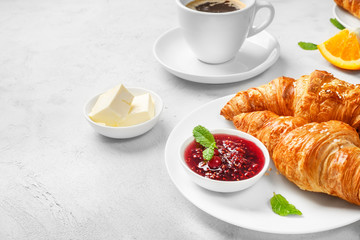 Delicious breakfast with fresh croissants