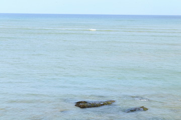 Fototapeta premium deep blue sea and rocks