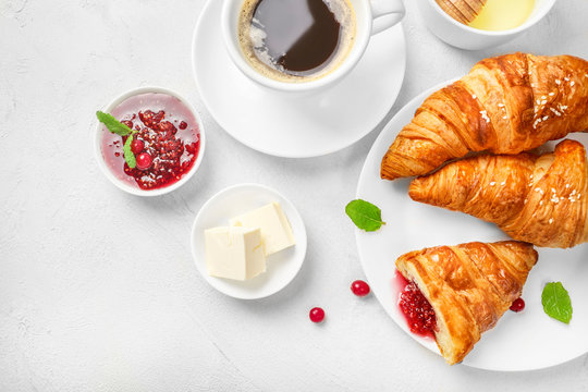 Delicious breakfast with fresh croissants