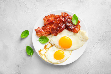 Traditional american breakfast with bacon and eggs
