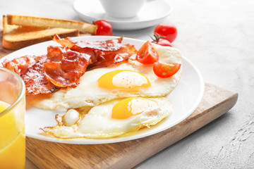 Traditional american breakfast with bacon and eggs